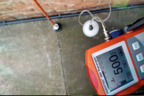 Acoustic leak detection equipment being used